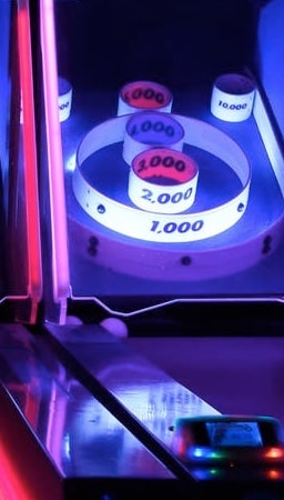 Brightly lit arcade machine with game lights